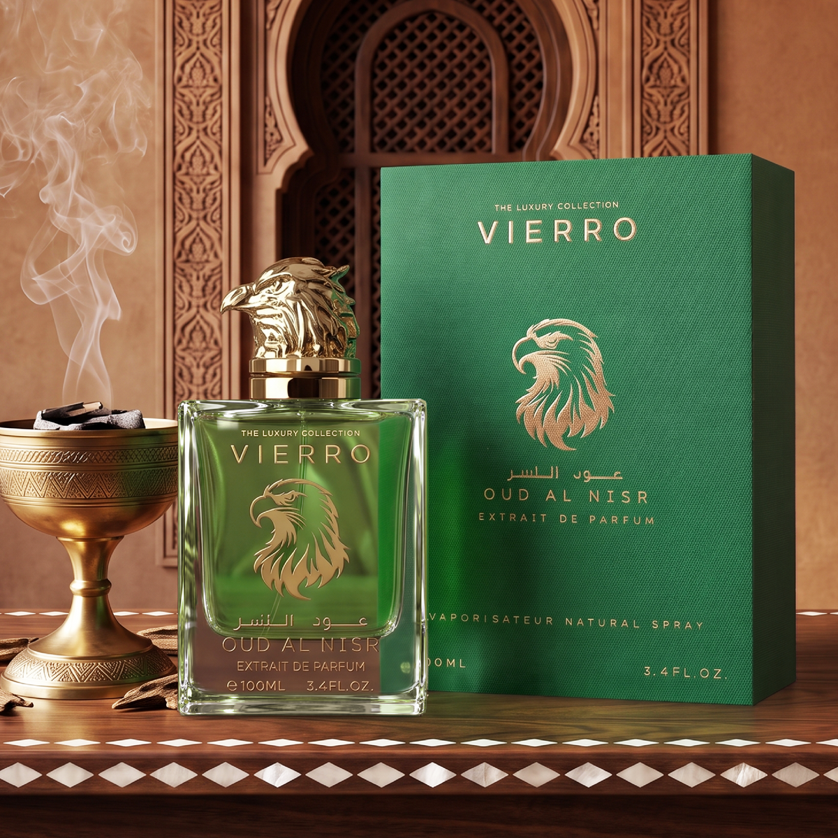 A 100ml bottle of OUD AL NISR Extrait de Parfum by Vierro featuring a gold eagle head cap next to its matching green product box on an ornate wooden surface with an incense burner in the background.